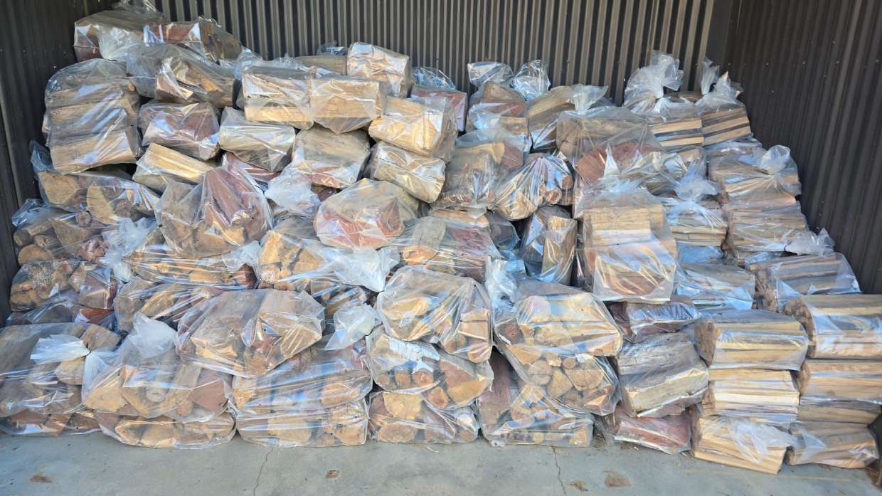 Stack of bagged firewood