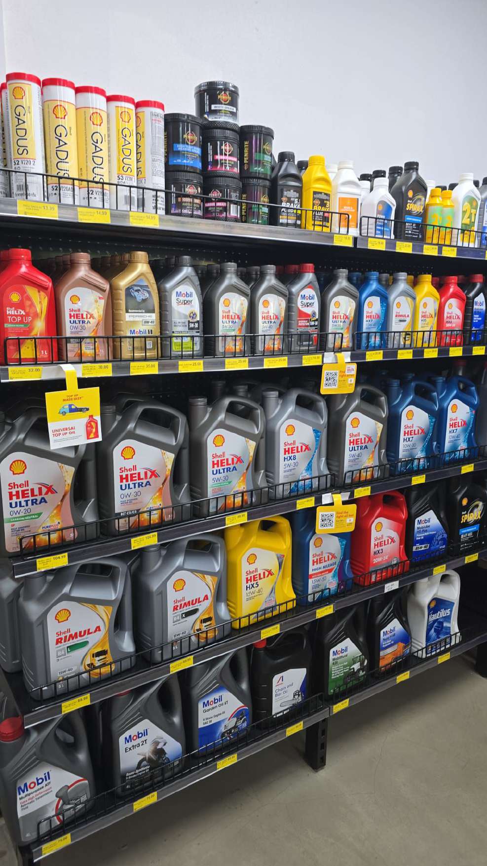 Bottles of oil on a shelf